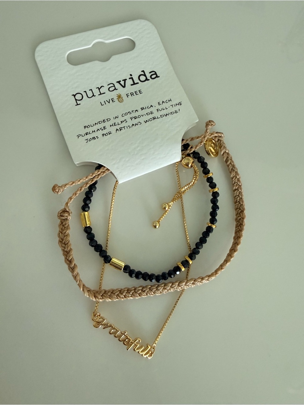 Pura Vida Black, Tan & Gold Layered Bracelet Stack with 'grateful' Script - Picture 2 of 4